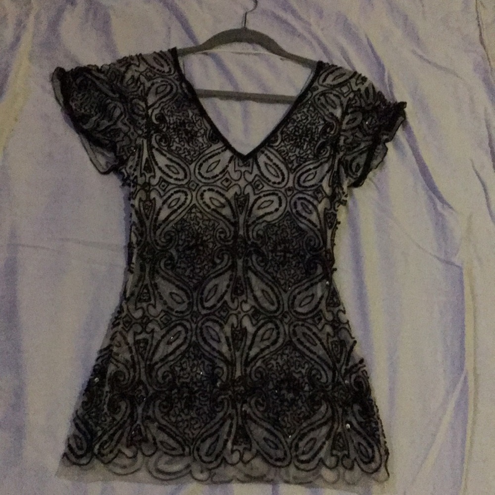 Sequined top.